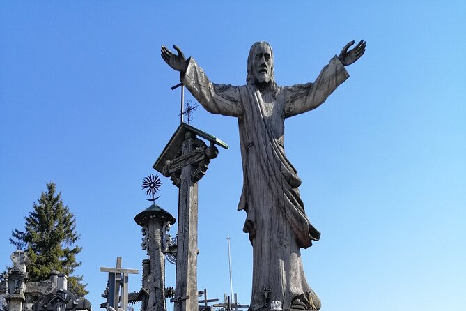5,5 Hour Small Group Tour to Hill of Crosses from Riga - Stop 1 in Eleja: a short border-area photo pause