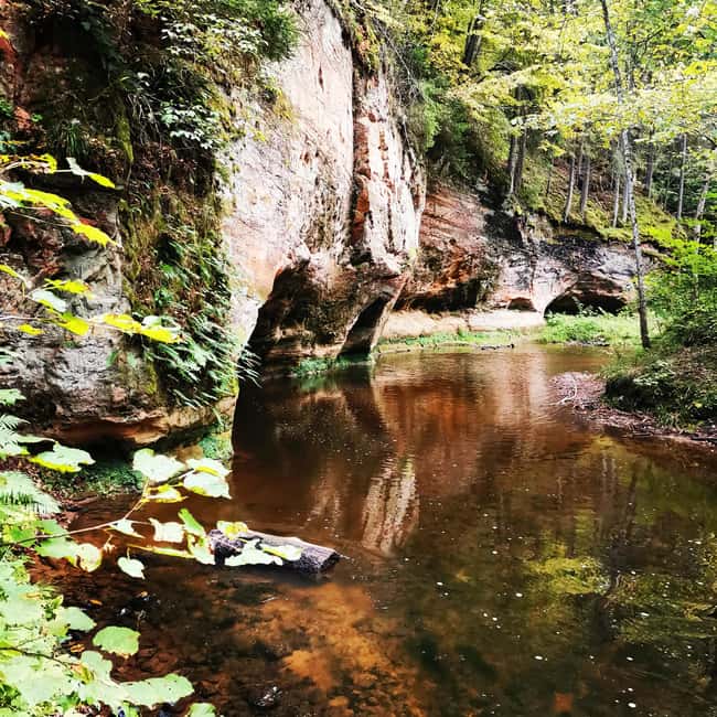 From Riga: Ligatne Village and Gauja River National Park … - Human-made caves: small stops that add texture to the hike