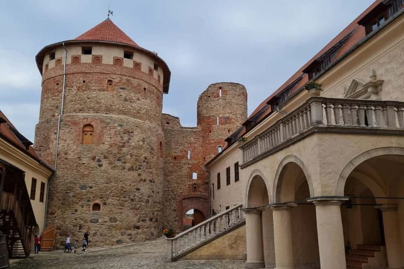 Latvian Palace and Medieval Castle Private Trip - Road trip comfort: pickup from Riga with an air-conditioned minivan
