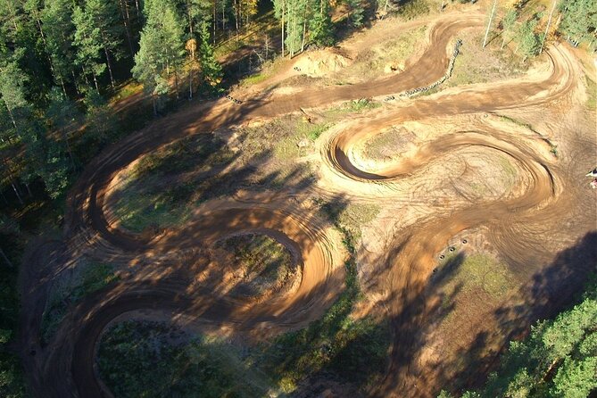 Private Snowmobile or ATV Safari with Riga Black Balsam Tasting - ATV or quad bike, and what the included gear changes