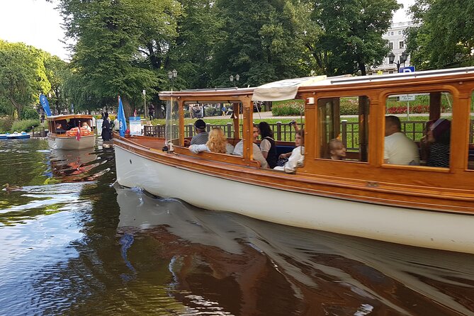 Riga City Canal & Daugava River Premium Boat Tour with Audioguide - National Library of Latvia, Old Town skyline, and Big Christopher