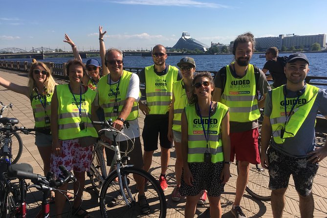 Riga Highlights Bike Tour - Bikes, Helmets, and the Earpiece Setup That Makes the Tour Click