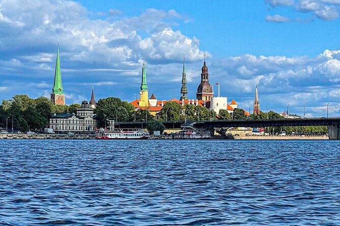 Riga Sightseeing Tour by Canal Boat with Audioguide - Kipsala Island and Vansu Bridge: Wooden Houses to a Bridge Story